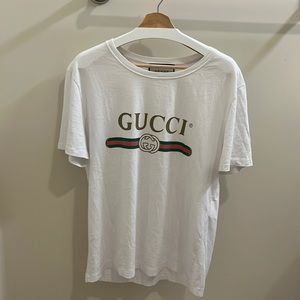 Authentic Gucci White t-shirt with gold, pink, and green details